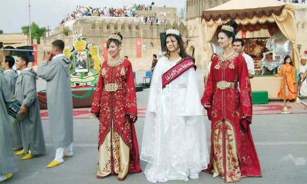 The Cherry Queen and her court in traditional caftans during the Sefrou Cherry Festival parade