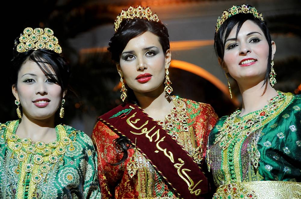The 2010 Sefrou Cherry Queen with her two attendants in Moroccan caftans