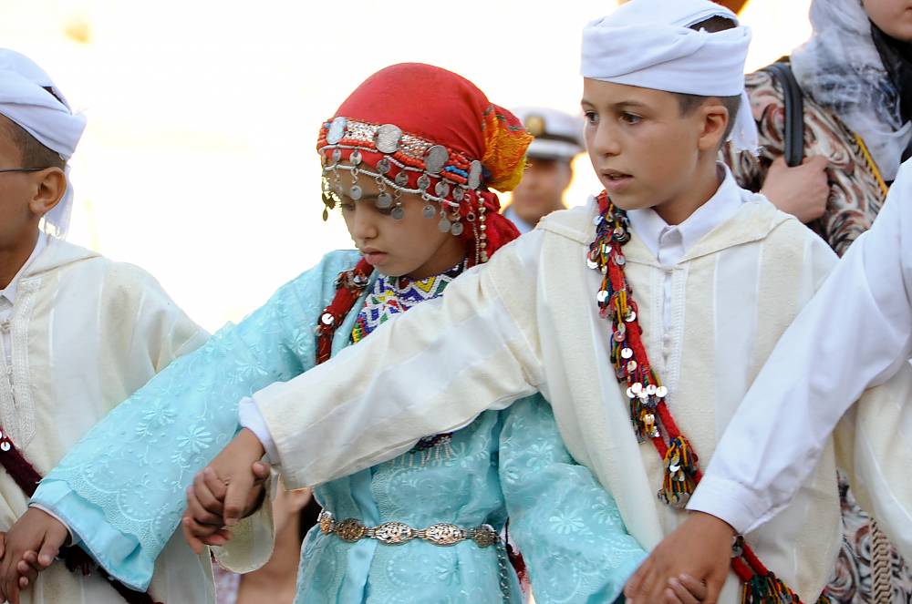 Children performing a mixed Ahidous dance at the Sefrou Cherry Festival